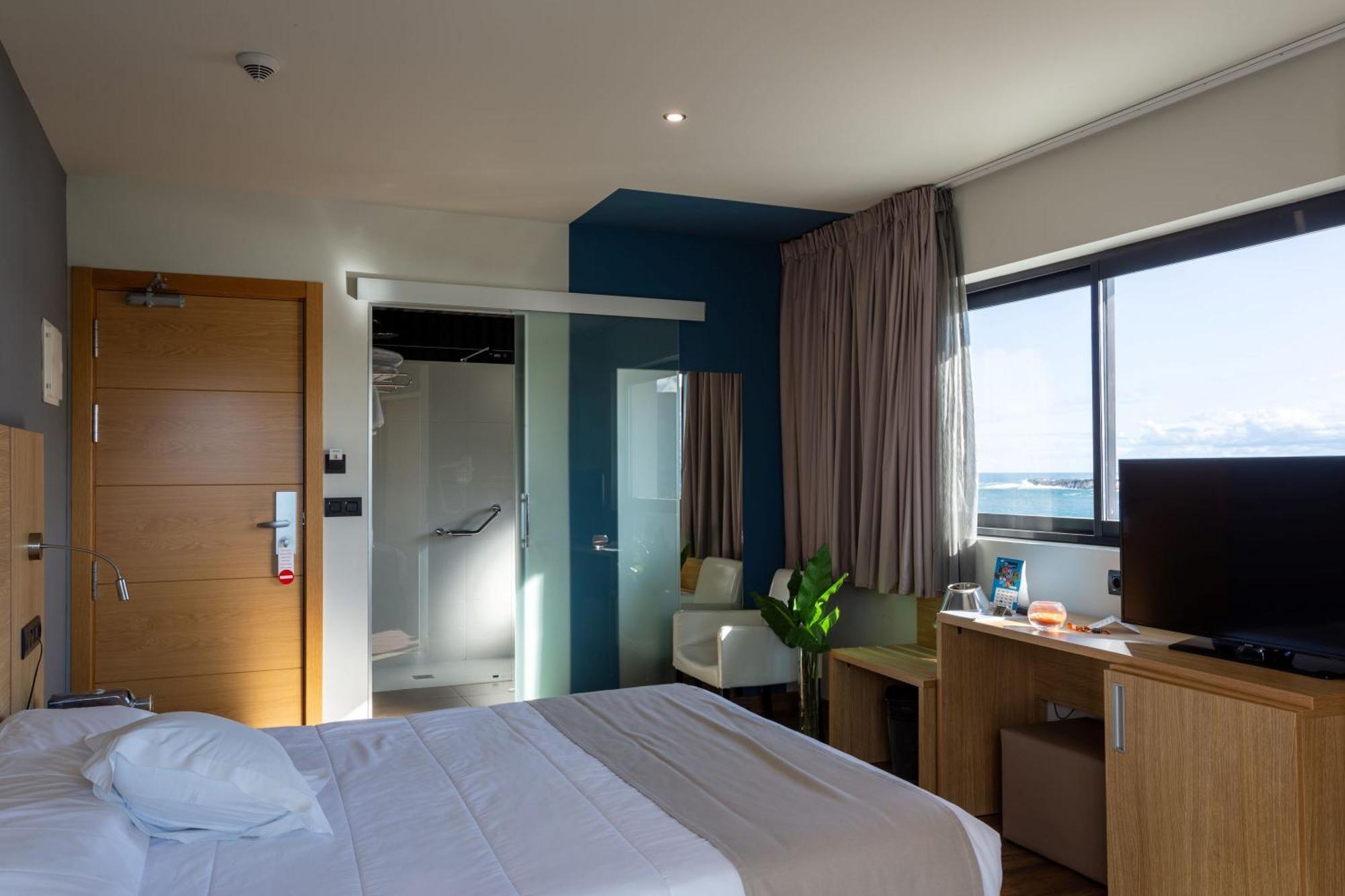 Hotel Astuy Isla Plana Quarto foto
